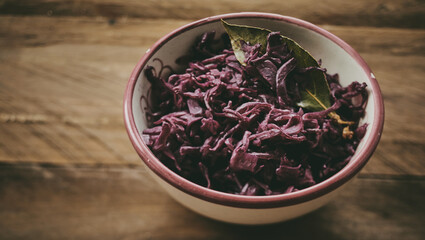 Obraz na płótnie Canvas Bowl of sauerkraut with bay leaf