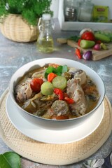 Chicken cooked with sweet and sour seasoning