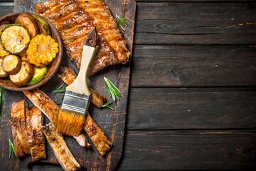 Grilled ribs and vegetables.