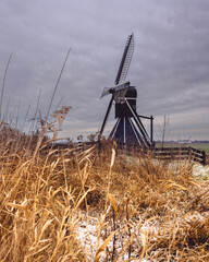 Mellemolen, dutch windmill in Akkrum, the Netherlands. In the winter with Some snow.