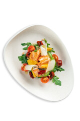 Warm salad with shrimp, arugula, parmesan and tomatoes, served on a plate, isolated on a white background