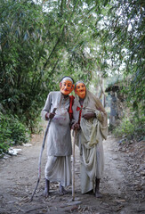 Hindu religious village people celebrating gajan festival wearing colourful costumes 
