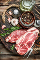 Raw steaks from juicy pork.