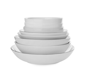 Set of clean dishes on white background