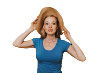 Excited young redhead woman in blue t-shirt and hat with wide open eyes over transparent background, smiles, Traveling on summer, walk on beach, surprised. Rest and vacations concept. Leisure activity