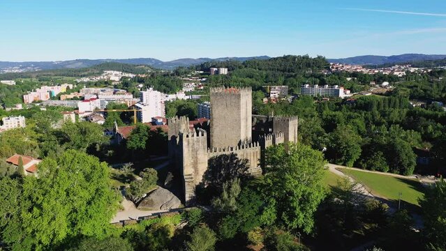 The medieval castle in the city of Guimaraes , Europe, Portugal, North, in summer on a sunny day.