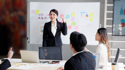business people meeting with employees and raised hands in congratulations.