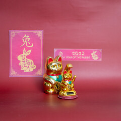 Celebration  Chinese new year 2023 year  of the  Rabbit  with  Maneki Neko waving  lucky  cat