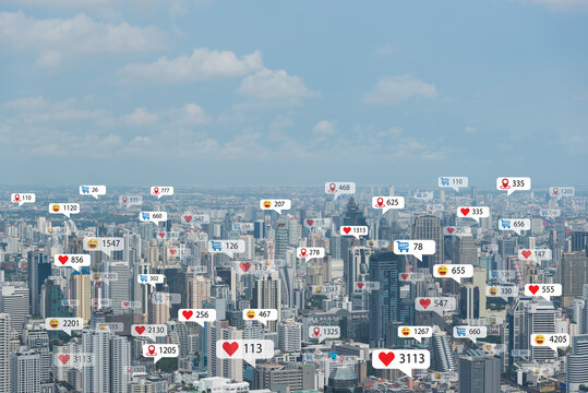 Social media notification icons over smart futuristic city Communication network, Io T (Internet of Things) concept