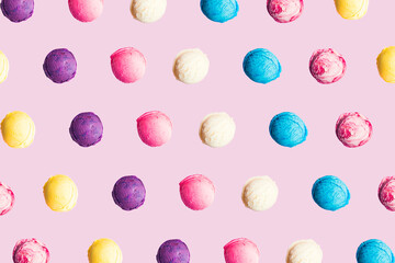 Pattern with colorful ice cream scoops on pink