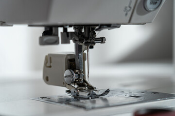 Needle of a sewing machine and part around it