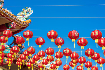 Fototapeta premium red lantern decoration for Chinese New Year Festival at Chinese shrine Ancient chinese art with the Chinese alphabet Blessings written on it Is a Fortune blessing compliment,Is a public place Thailand