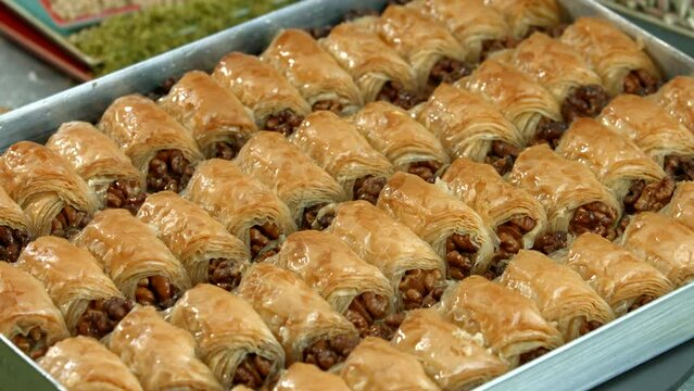 Traditional turkish baklava pistachio pastry. Dilberdudagi, ozel kesim baklava, cikolatali baklava, fistikli baklava, katmer, fistikli kadayif, kattafi, fistik sarma, soguk baklava, midye baklava, cev