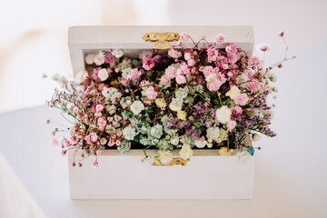 Flowers Meadow Natural Decoration on Casket Box Close-up Photo. Wild Meadow Aroma Herb in Stylish Elegance Container, Celebrative Present at Mother Day. Fashionable Floristic Season Ornament