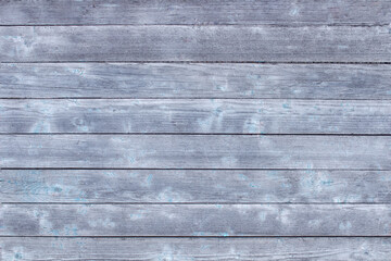 Fototapeta premium Wooden grey background. An old natural wooden table with a place to place the product.