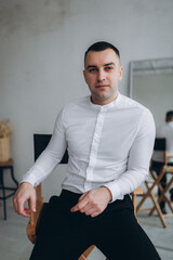 Fashion stylish male portrait. Young handsome man in studio