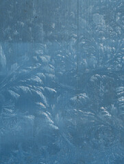 Frosty pattern on transparent corrugated glass