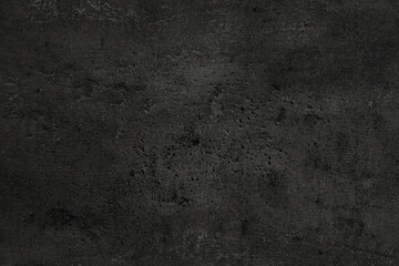Texture of black stone surface as background, closeup