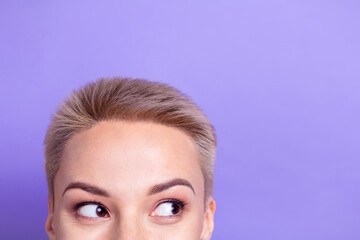Cropped photo of tricky cunning woman short haircut looking empty space isolated purple color...