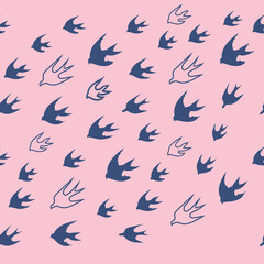 Seamless pattern with swallows and swifts birds on a pink background.