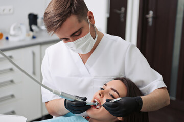 Woman receiving a dental treatment