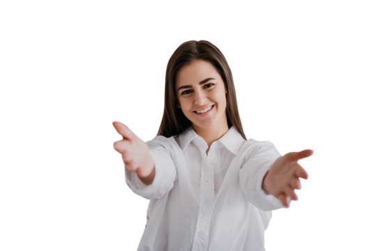Give me warm hug. Studio shot of friendly cute brunette female student pulling hands towards camera, tilting head and smiling from happiness, wanting cuddle with boyfriend over transparent background