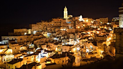 night landscape of the famous Sassi di Matera carved into the rock in Basilicata, Italy