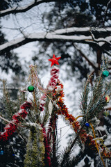 New Year's decorations in a snowy forest
