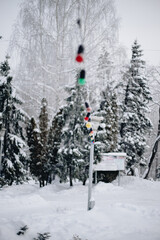 New Year's decorations in a snowy forest