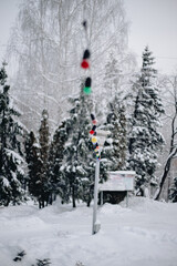 New Year's decorations in a snowy forest