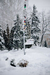 New Year's decorations in a snowy forest