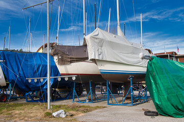 Yachts wrapped up for winter storage, Lipno marina. Czech Republic.