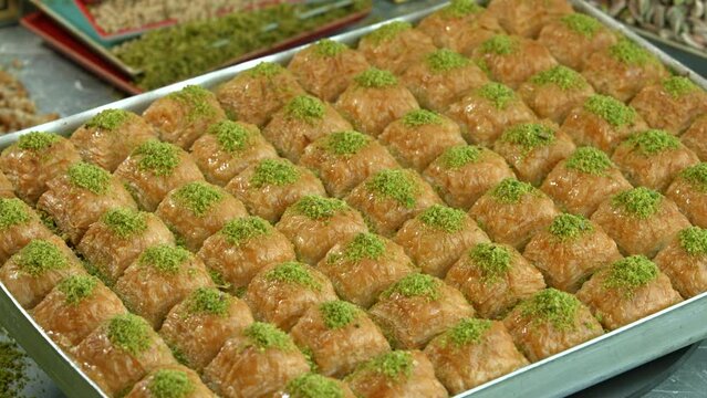 Traditional turkish baklava pistachio pastry. Dilberdudagi, ozel kesim baklava, cikolatali baklava, fistikli baklava, katmer, fistikli kadayif, kattafi, fistik sarma, soguk baklava, midye baklava, cev