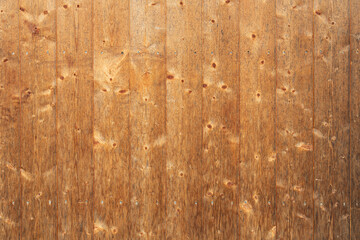 A texture of brown boards with knots and resin painted with impregnation for wood