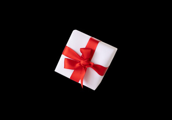 gift box on black background. Gift box with origami bows. 