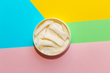 Snus pads, nicotine spiders on a paper background, the concept of a bad habit.