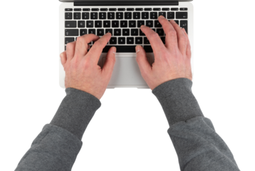 top down view of person typing on laptop computer, transparent background PNG