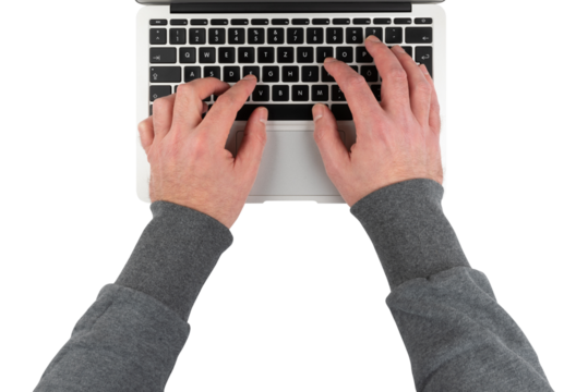 top down view of person typing on laptop computer, transparent background PNG