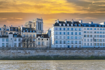 Paris, ile saint-louis and quai aux Fleurs, beautiful ancient buildings, with the Notre-Dame...