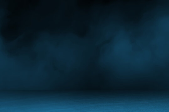 Fototapeta blue concrete marble stone floor with smoke float use as background for advertising. abstract dark blue background, smoke, smog. empty dark scene, neon light, spotlights. concrete floor.