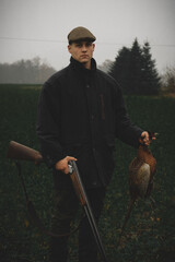 hunter with pheasant 