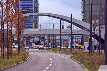 Main road with bridge in the background at industrial district at City of Zürich on a cloudy autumn noon. Photo taken November 30th, 2022, Zurich, Switzerland.