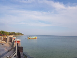 A pier for anchor ships and small boats on a beach called Tirta Samudera Beach or Bandengan Beach