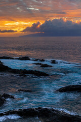 Sunset over the ocean and La Gomera island, one of Spain's Canary Islands