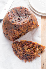 Christmas pudding with cranberries, raisins and prunes, whiskey