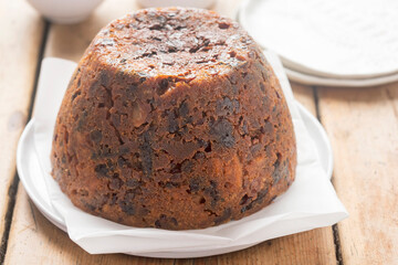 Christmas pudding with cranberries, raisins and prunes, whiskey - 562501329