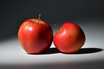 red apples on black background