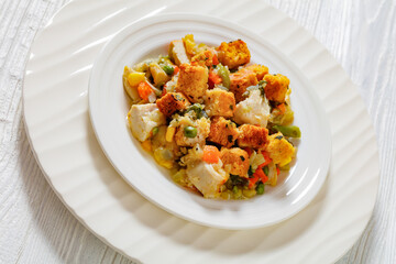 turkey pot pie with stuffing crust on plate