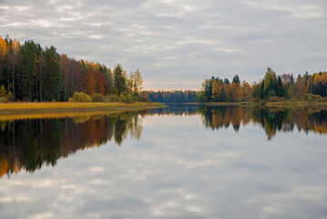 Fototapeta na wymiar River landscape in autumn. Farnebofjarden national park in north of Sweden.