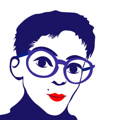 A woman with glasses who is looking straight at you